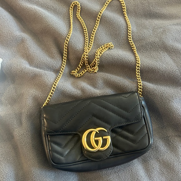 Gucci Handbags - SOLD! Black Cross Body Gucci Marmot Super Mini